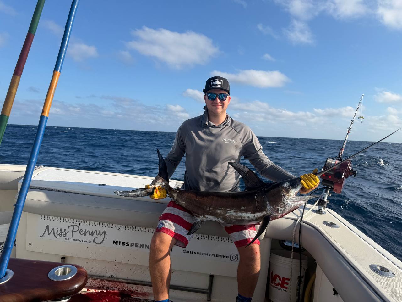 Jack holding a swordfish aboard Miss Penny during a two-day offshore trip out of Islamorada