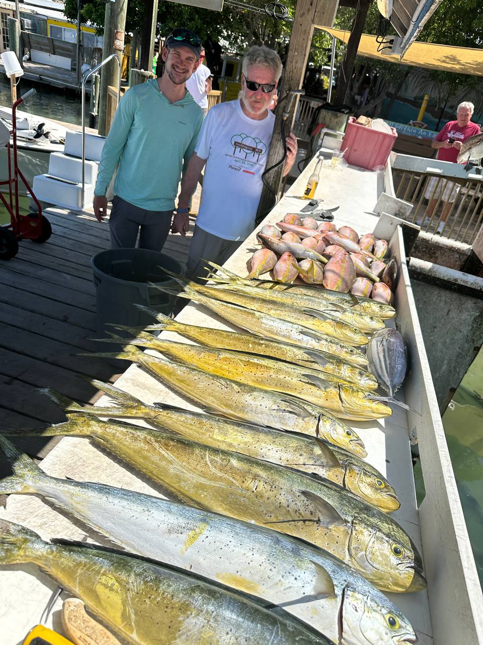 Miss Penny catch table with mahi and snapper from a productive May trip in Islamorada